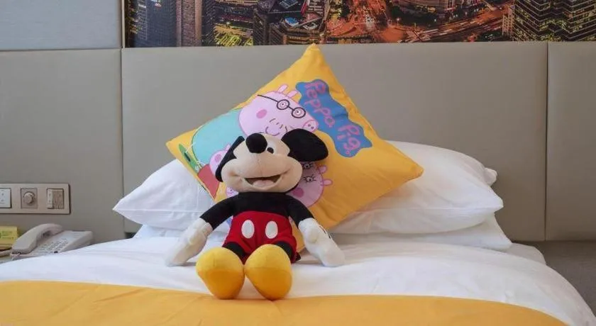 Bed in Vienna Hotel Shaanxi Hanzhong Central Square High-Speed Railway Station