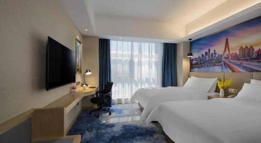 Bed in Vienna Hotel Shaanxi Hanzhong Central Square High-Speed Railway Station