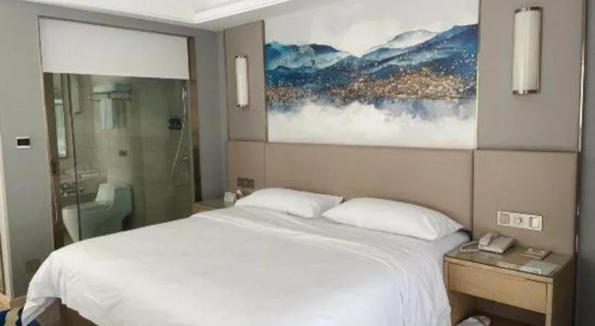 Bed in Vienna Hotel Shaanxi Hanzhong Central Square High-Speed Railway Station