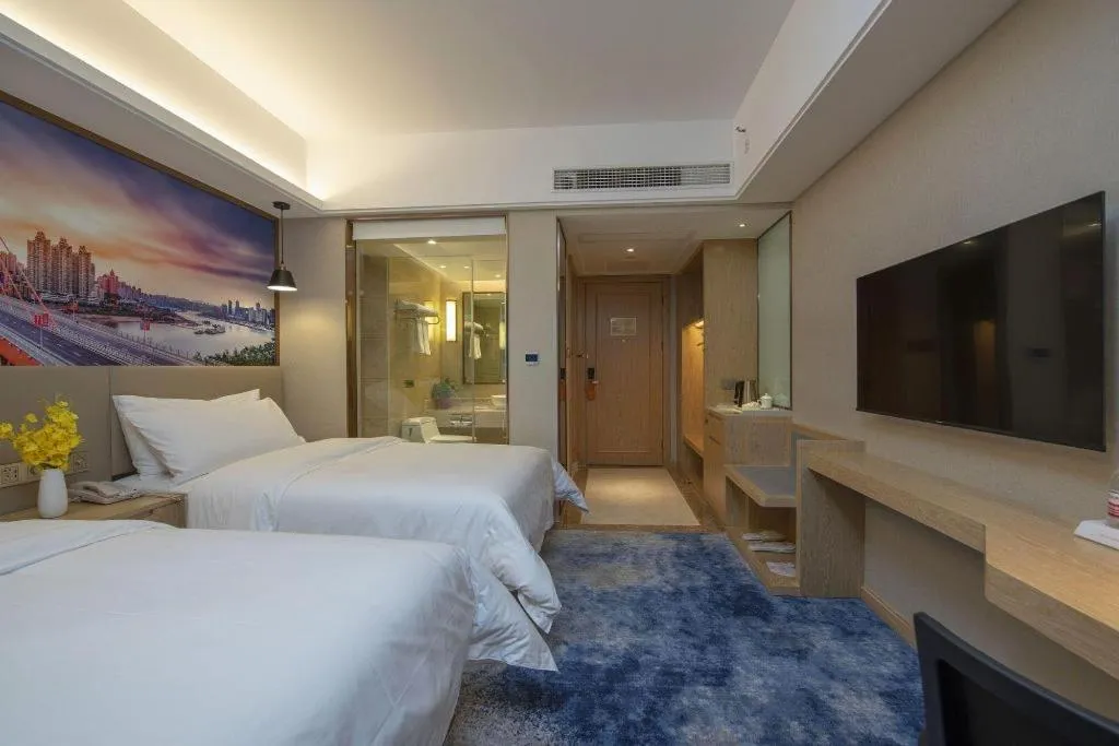 Bed in Vienna Hotel Shaanxi Hanzhong Central Square High-Speed Railway Station