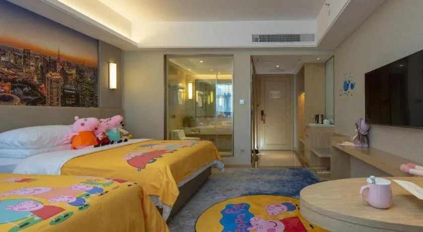 Bed in Vienna Hotel Shaanxi Hanzhong Central Square High-Speed Railway Station