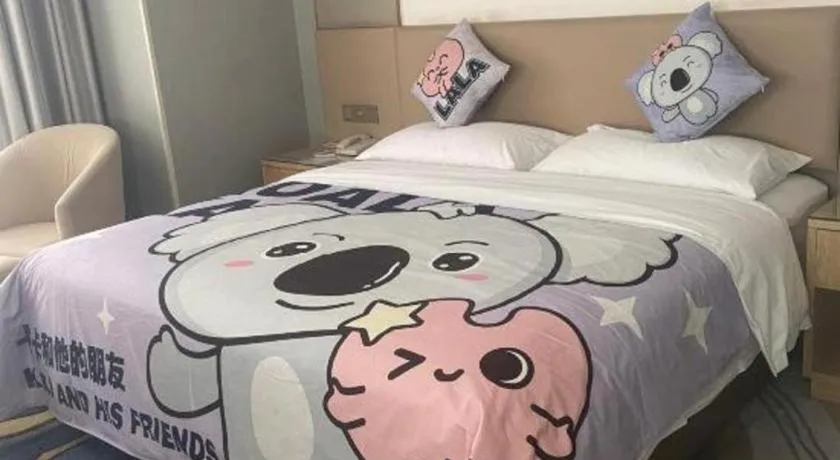 Bed in Vienna Hotel Shaanxi Hanzhong Central Square High-Speed Railway Station