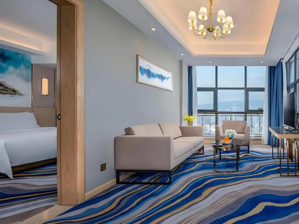 Bed in Vienna Hotel Shaanxi Hanzhong Central Square High-Speed Railway Station