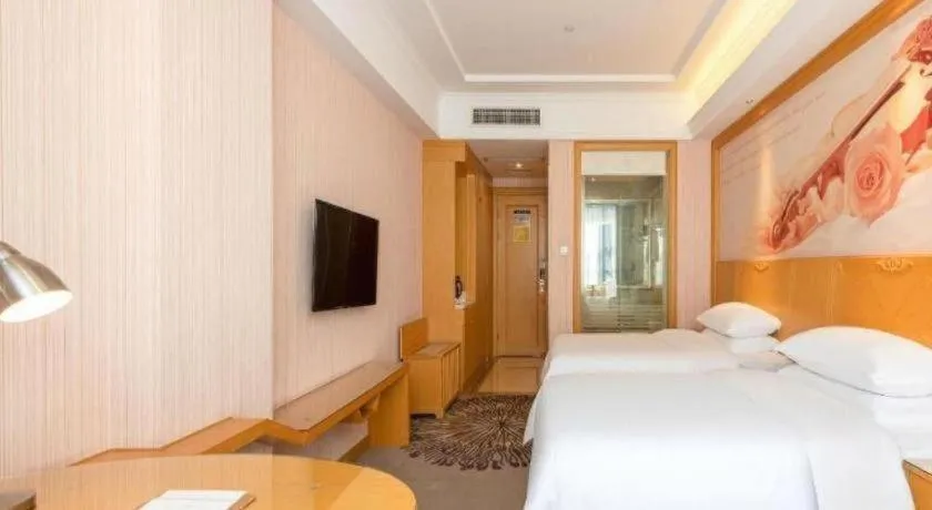 Bed in Vienna Hotel Guangzhou North Station Huaguoshan Metro Station
