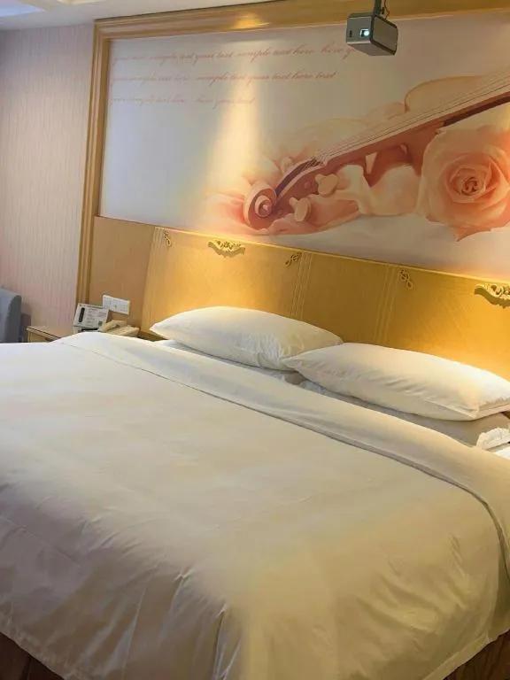 Bed in Vienna Hotel Guangzhou North Station Huaguoshan Metro Station