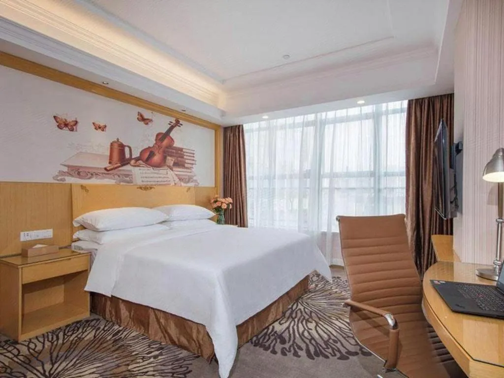 Bed in Vienna Hotel Guangzhou North Station Huaguoshan Metro Station