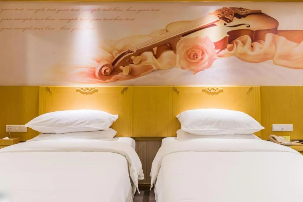 Bed in Vienna Hotel Guangzhou North Station Huaguoshan Metro Station