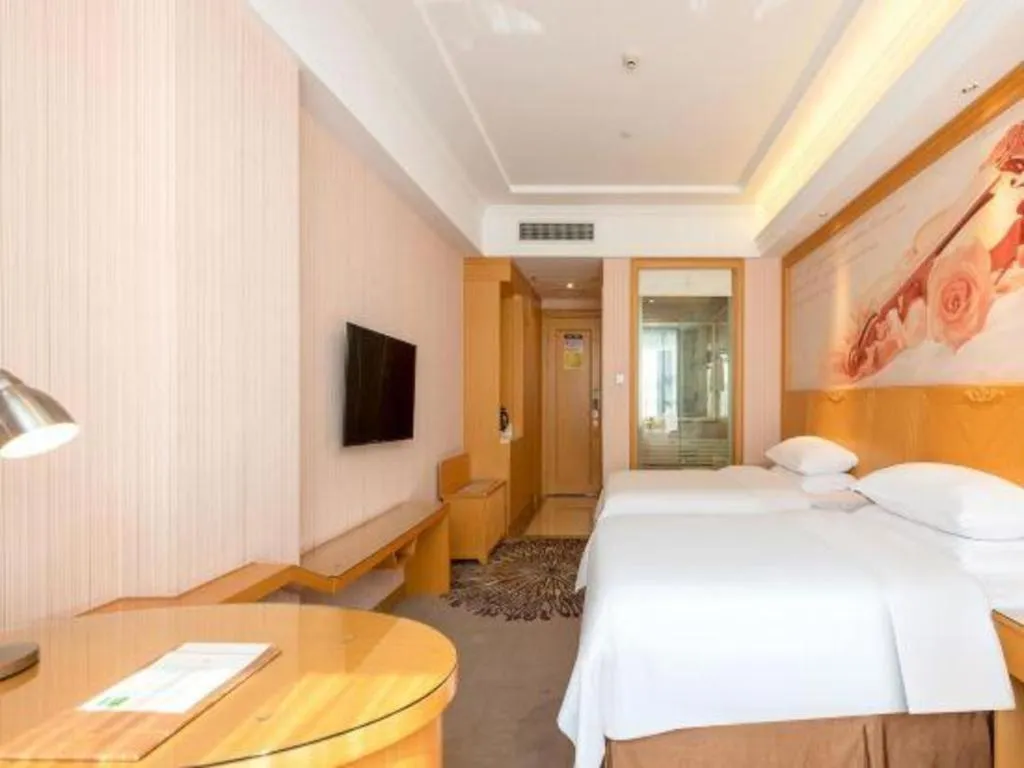 Bed in Vienna Hotel Guangzhou North Station Huaguoshan Metro Station