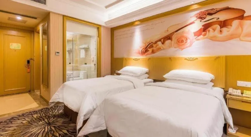 Bed in Vienna Hotel Guangzhou North Station Huaguoshan Metro Station