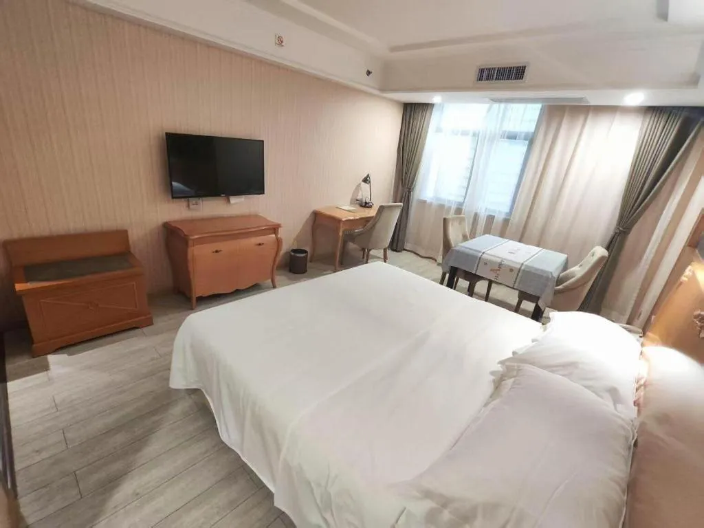 Bed in Vienna Hotel Shaanxi Ankang Jiangnan