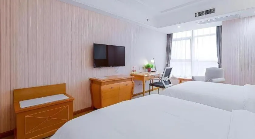 Bed in Vienna Hotel Shaanxi Ankang Jiangnan