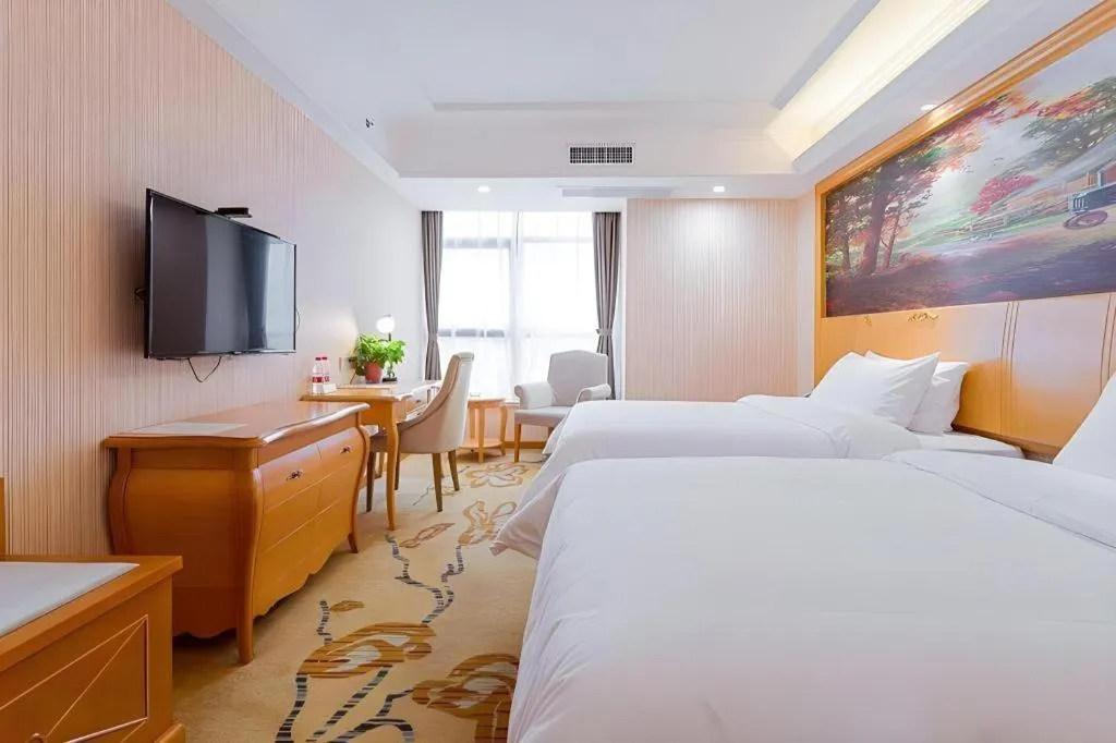 Bed in Vienna Hotel Shaanxi Ankang Jiangnan