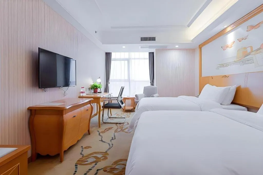 Bed in Vienna Hotel Shaanxi Ankang Jiangnan