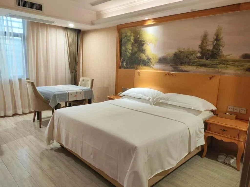 Bed in Vienna Hotel Shaanxi Ankang Jiangnan