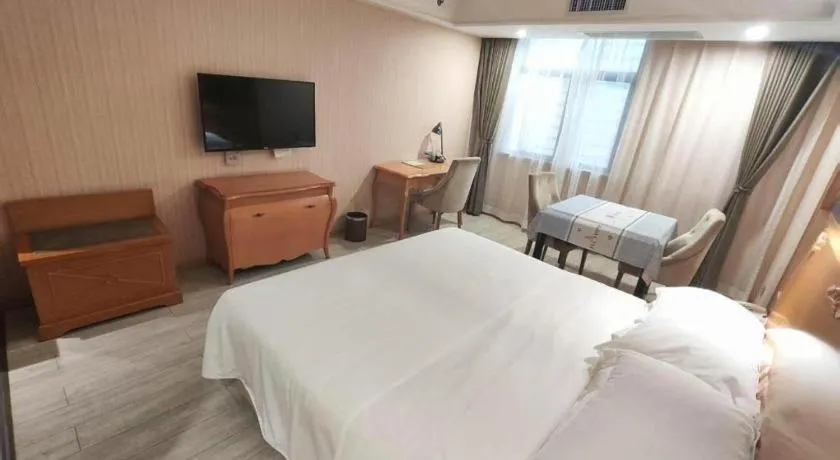 Bed in Vienna Hotel Shaanxi Ankang Jiangnan