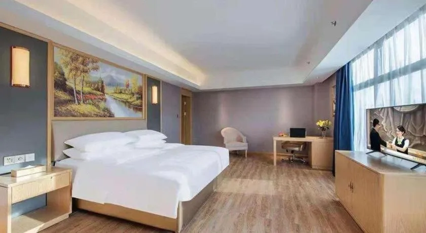 Bed in Vienna Hotel Guangdong Zhongshan South Area Passenger Station