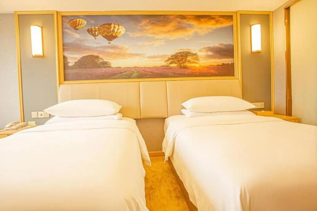 Bed in Vienna Hotel Guangdong Zhongshan South Area Passenger Station