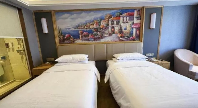 Bed in Vienna Hotel Guangdong Zhongshan South Area Passenger Station