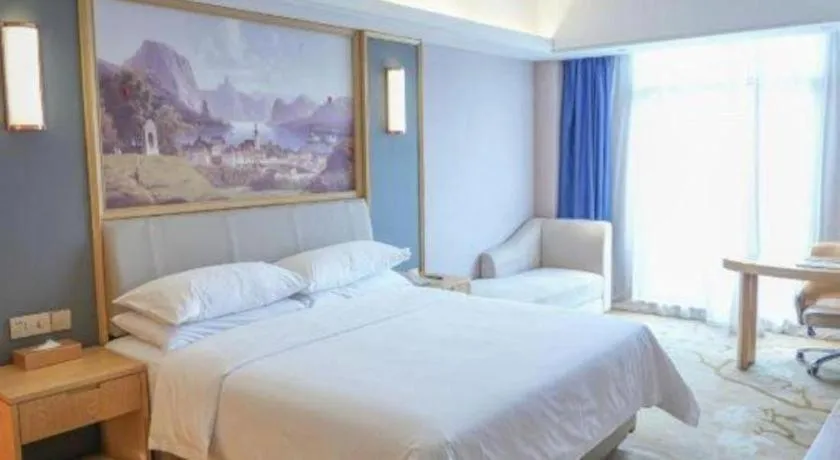 Bed in Vienna Hotel Guangdong Zhongshan South Area Passenger Station