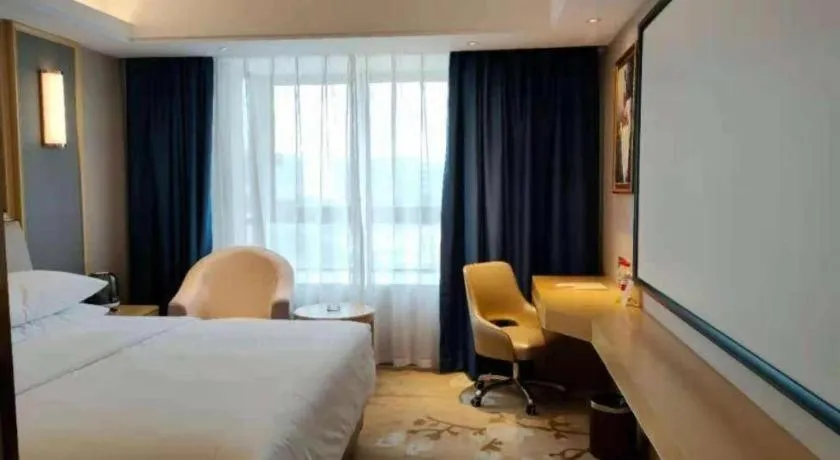 Bed in Vienna Hotel Guangdong Zhongshan South Area Passenger Station