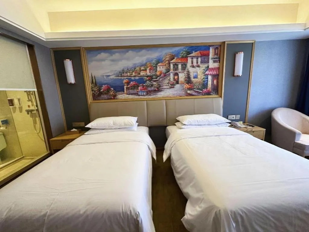 Bed in Vienna Hotel Guangdong Zhongshan South Area Passenger Station