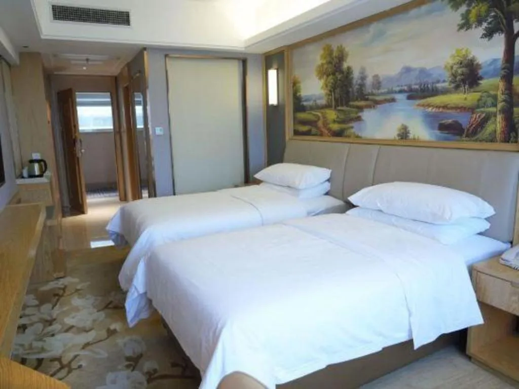 Bed in Vienna Hotel Guangdong Zhongshan South Area Passenger Station