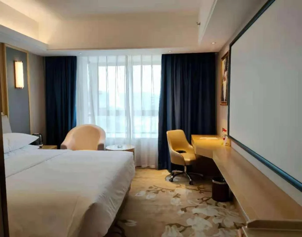 Bed in Vienna Hotel Guangdong Zhongshan South Area Passenger Station