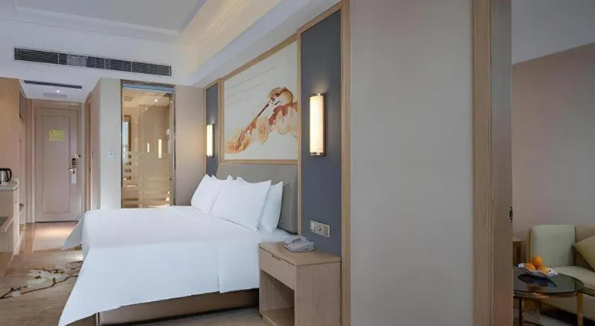 Bed in Vienna Hotel Guangdong Dongguan East Station