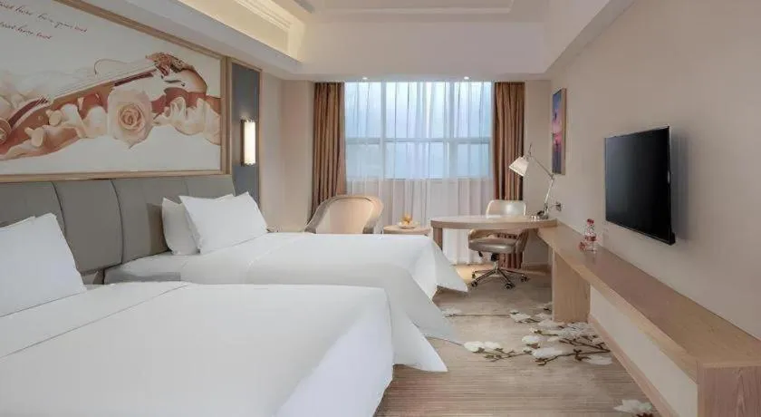 Bed in Vienna Hotel Guangdong Dongguan East Station