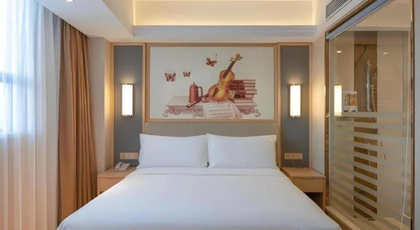 Bed in Vienna Hotel Guangdong Dongguan East Station