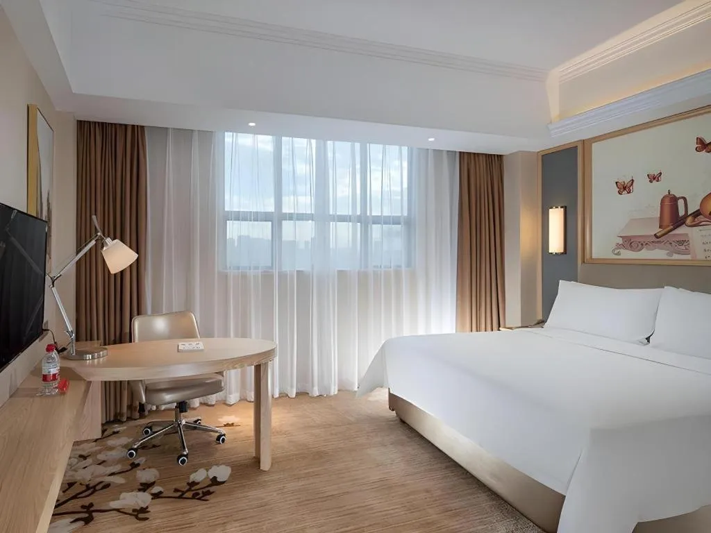 Bed in Vienna Hotel Guangdong Dongguan East Station