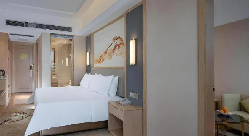 Bed in Vienna Hotel Guangdong Dongguan East Station