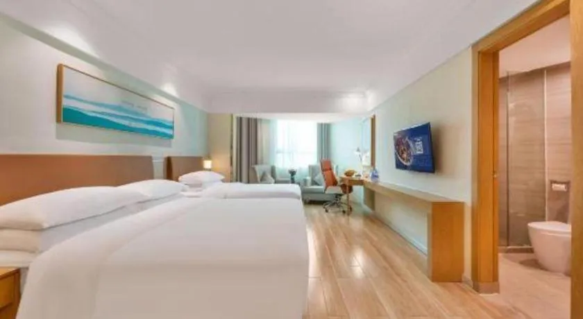 Bed in Vienna Hotel Guangdong Foshan Shunde Longjiang Material City