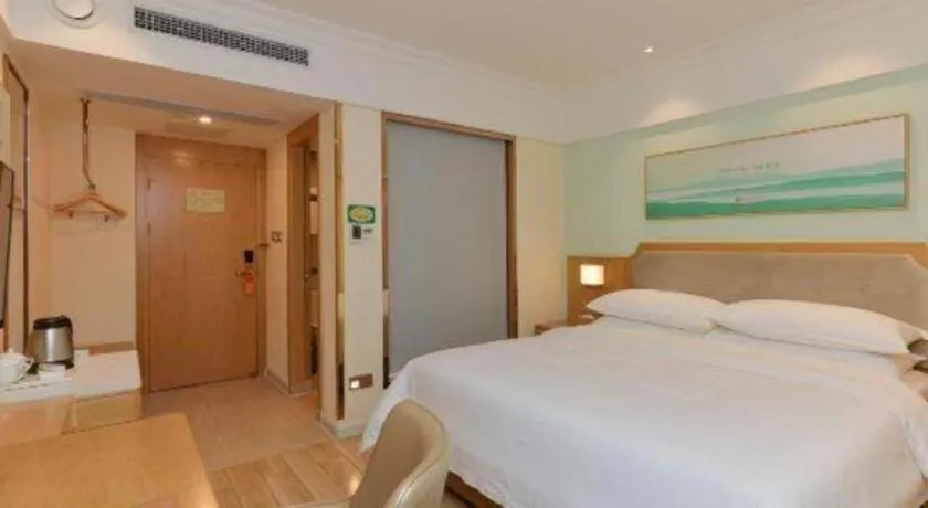 Bed in Vienna Hotel Guangdong Foshan Shunde Longjiang Material City