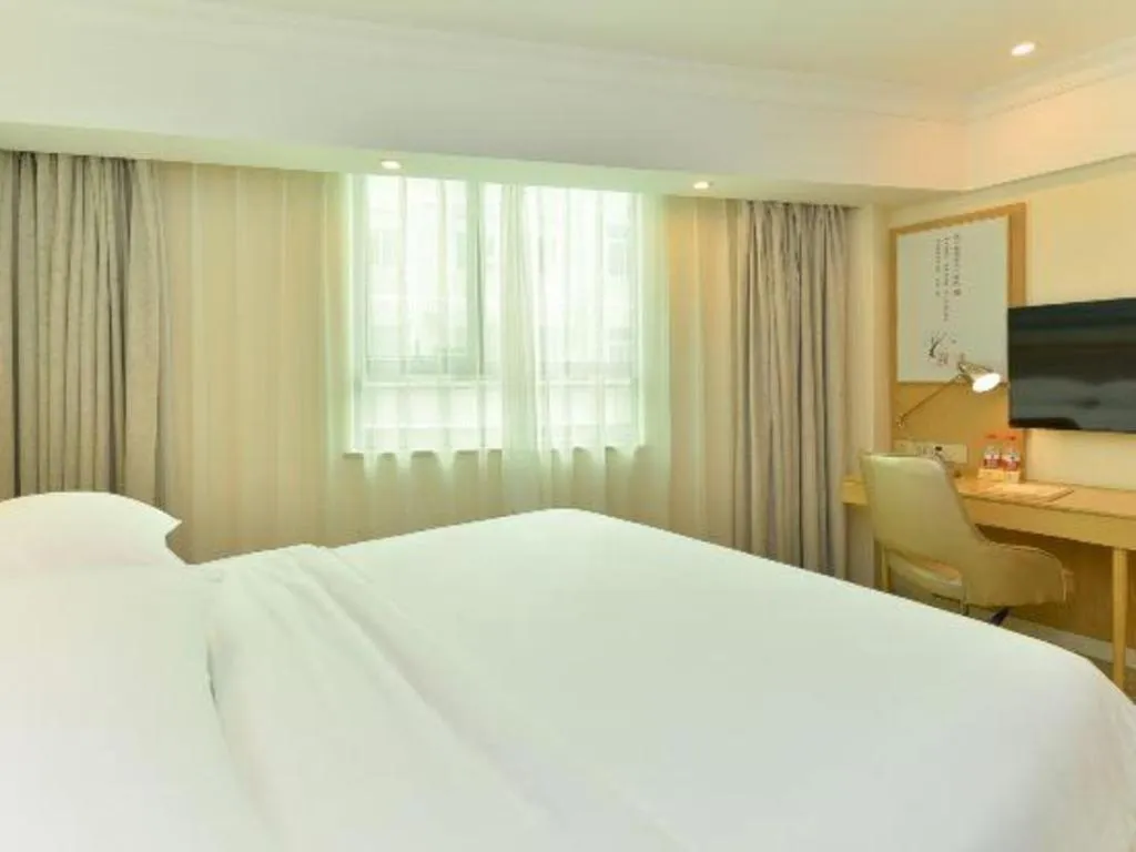 Bed in Vienna Hotel Guangdong Foshan Shunde Longjiang Material City