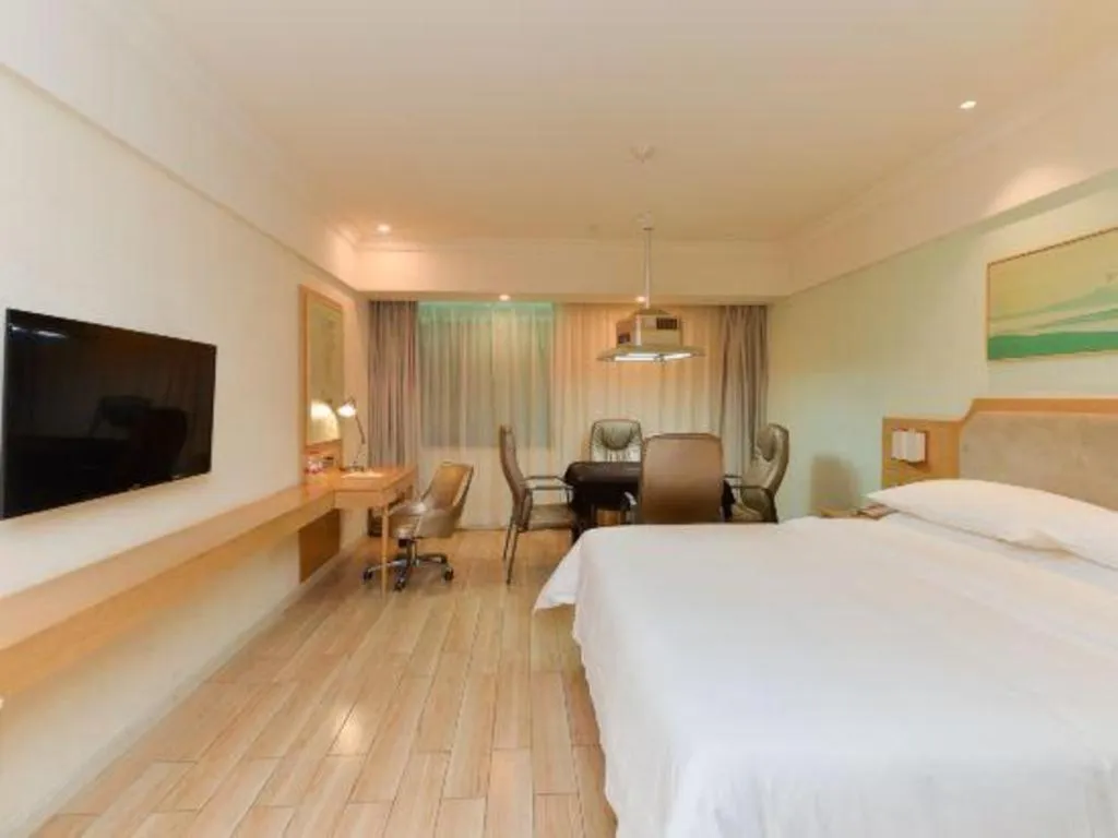 Bed in Vienna Hotel Guangdong Foshan Shunde Longjiang Material City