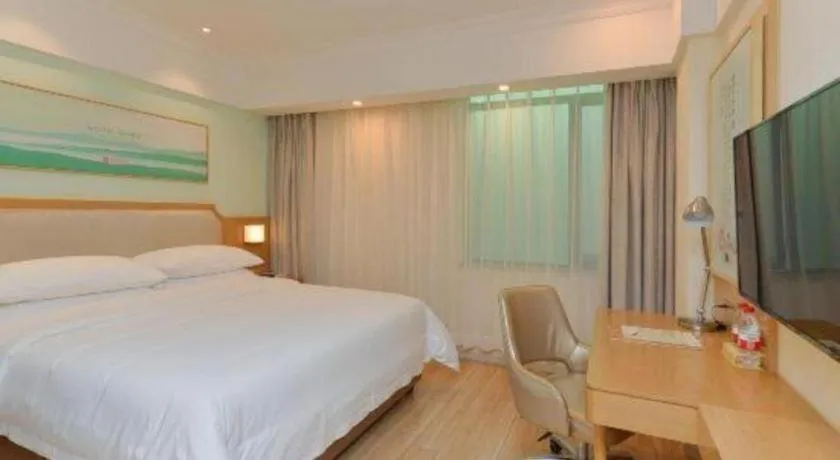 Bed in Vienna Hotel Guangdong Foshan Shunde Longjiang Material City