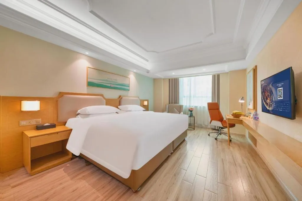 Bed in Vienna Hotel Guangdong Foshan Shunde Longjiang Material City
