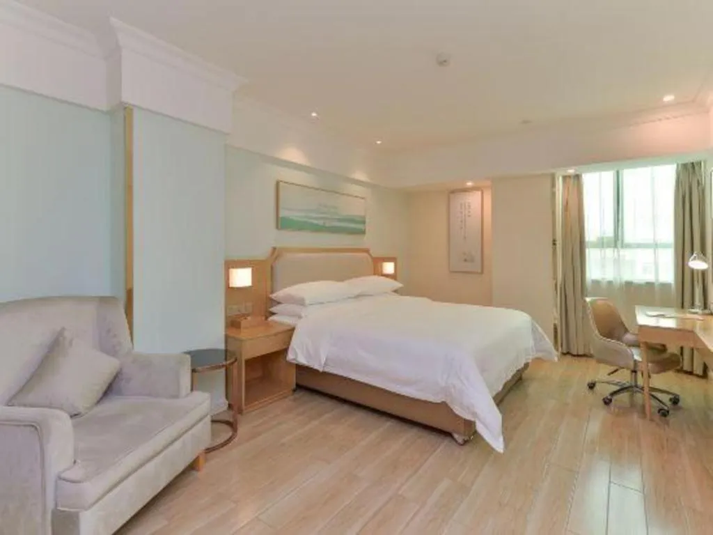 Bed in Vienna Hotel Guangdong Foshan Shunde Longjiang Material City