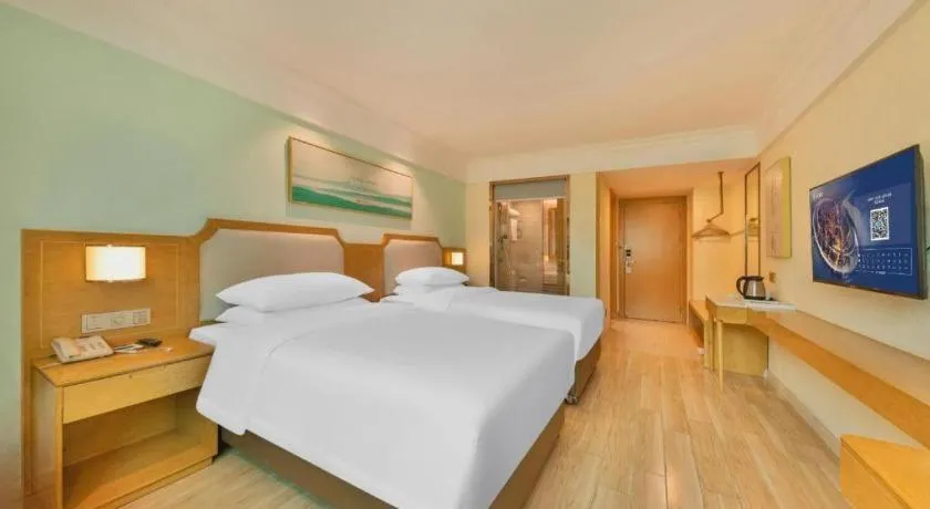 Bed in Vienna Hotel Guangdong Foshan Shunde Longjiang Material City