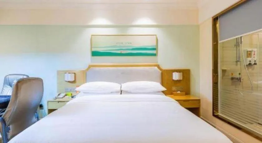 Bed in Vienna Hotel Guangdong Foshan Shunde Longjiang Material City