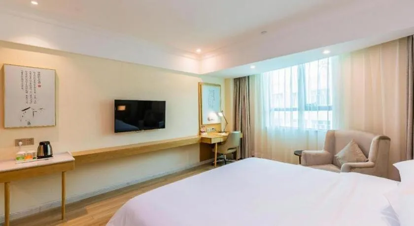 Bed in Vienna Hotel Guangdong Foshan Shunde Longjiang Material City