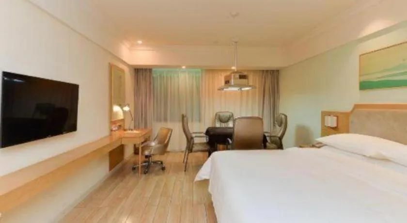 Bed in Vienna Hotel Guangdong Foshan Shunde Longjiang Material City