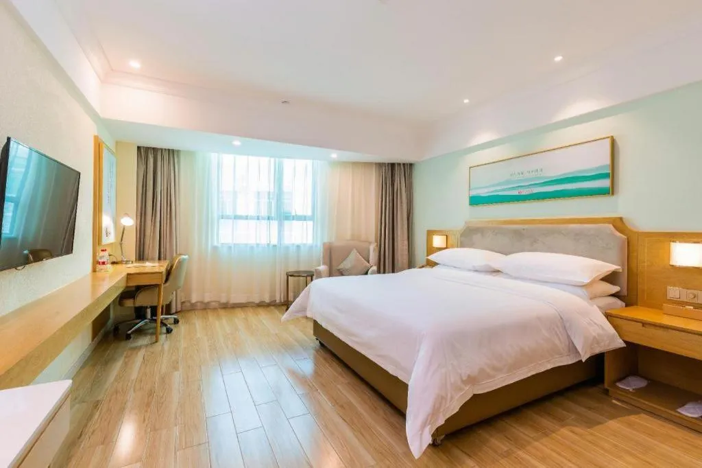 Bed in Vienna Hotel Guangdong Foshan Shunde Longjiang Material City