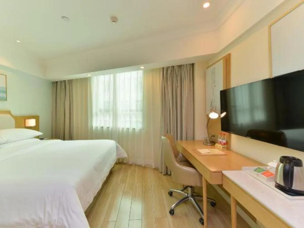 Bed in Vienna Hotel Guangdong Foshan Shunde Longjiang Material City