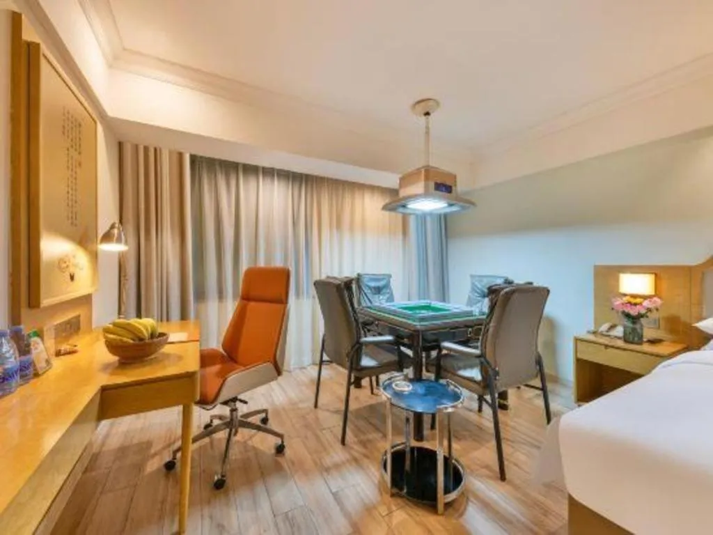 Bed in Vienna Hotel Guangdong Foshan Shunde Longjiang Material City