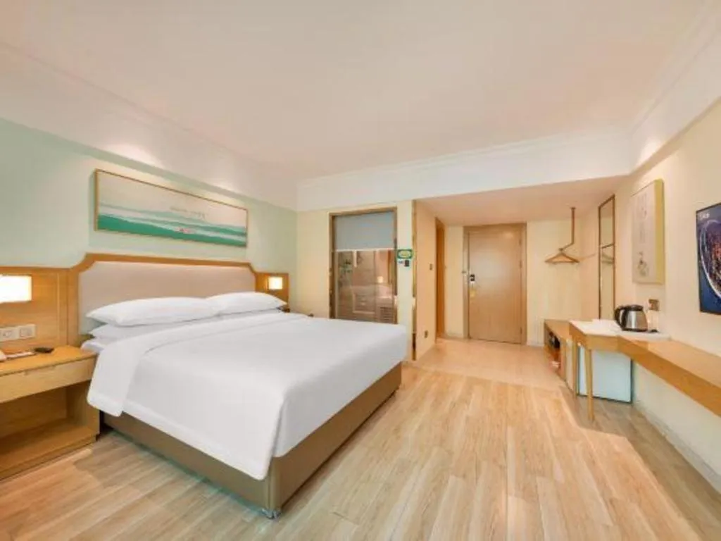 Bed in Vienna Hotel Guangdong Foshan Shunde Longjiang Material City