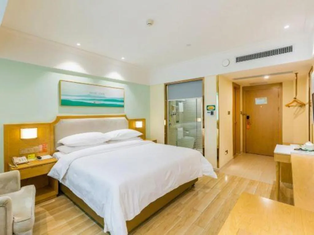 Bed in Vienna Hotel Guangdong Foshan Shunde Longjiang Material City