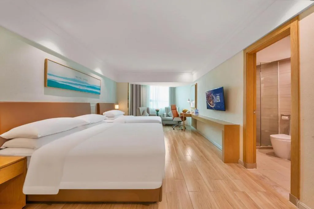 Bed in Vienna Hotel Guangdong Foshan Shunde Longjiang Material City