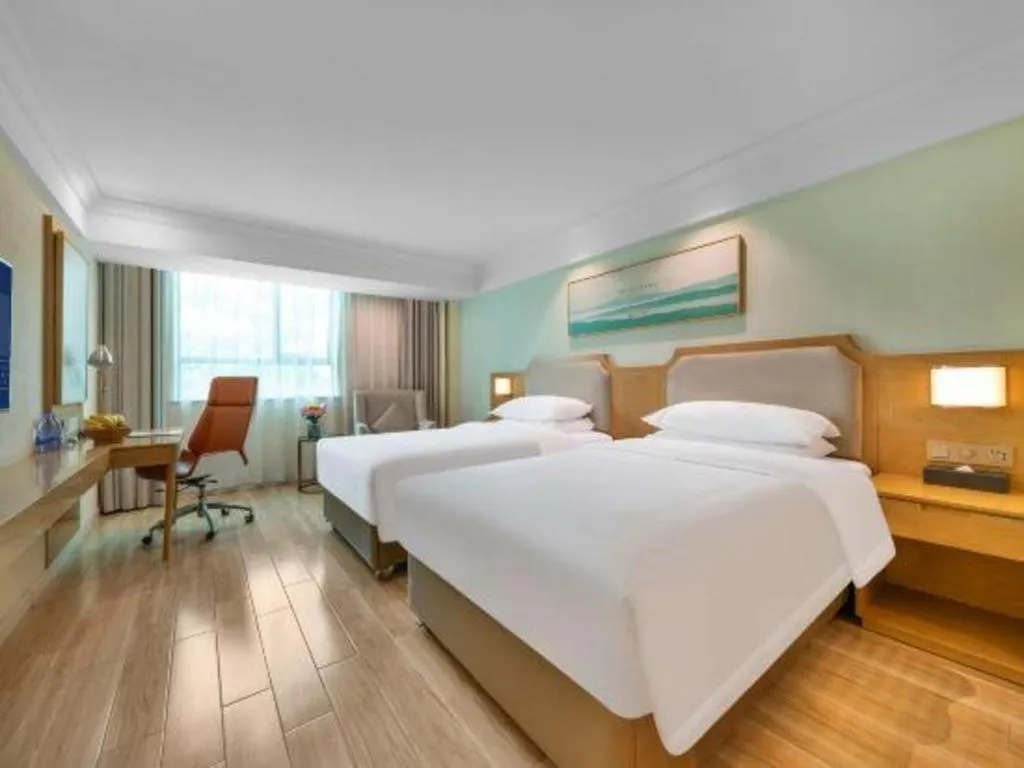 Bed in Vienna Hotel Guangdong Foshan Shunde Longjiang Material City